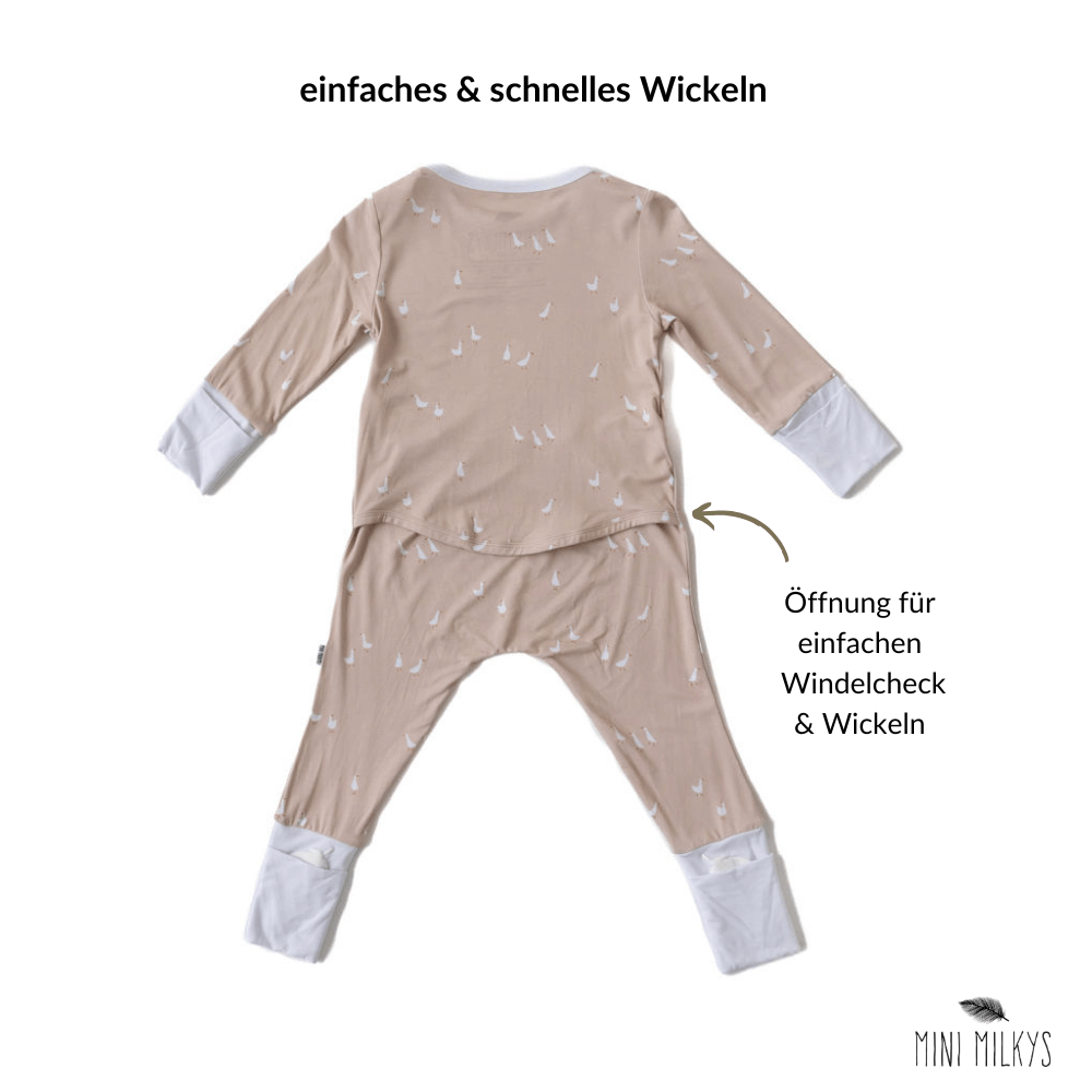 Mini Milkys mitwachsender Baby-Strampler aus weicher Bio Bambus Viskose, ohne Verschlüsse für einfaches Wickeln, ideal zum Spielen und Schlafen.